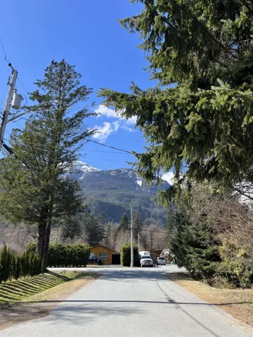 View of asphalt street with a mountain view