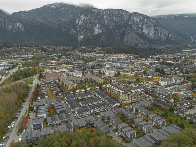 Aerial overview of property's location with a mountainous background
