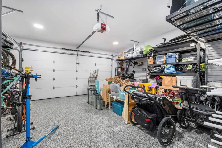Garage featuring a garage door opener