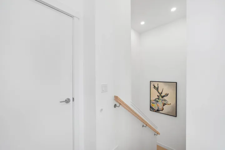Stairs featuring recessed lighting and baseboards