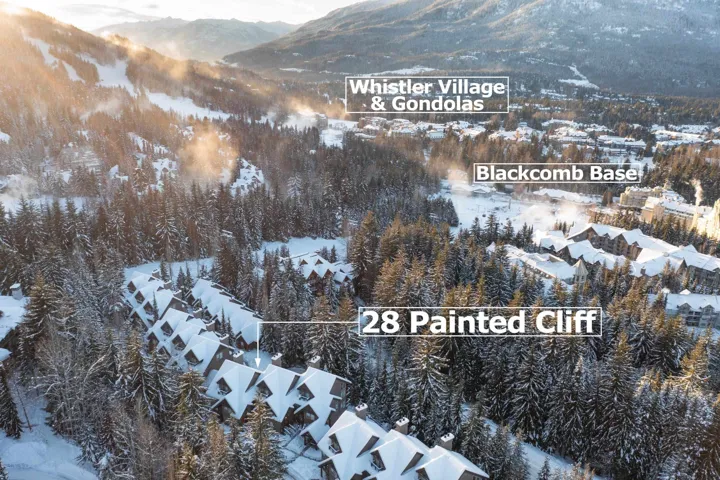 Snowy aerial view featuring a mountain view
