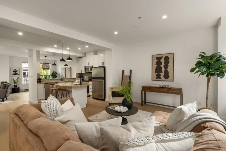 Living area featuring recessed lighting and light wood-style flooring