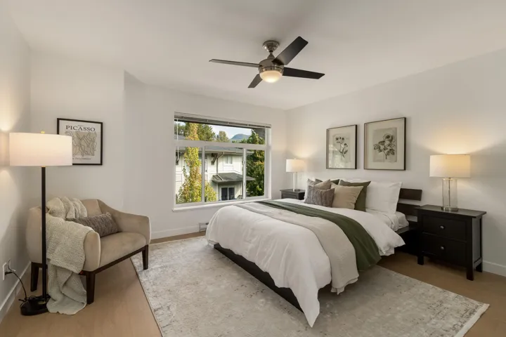 Bedroom featuring light wood finished floors and a ceiling fan