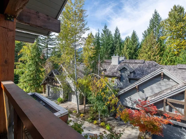 Exterior space with view of wooded area