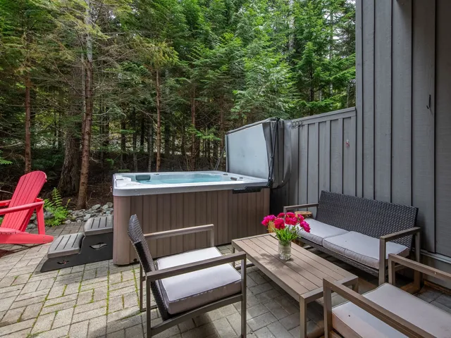 View of patio / terrace featuring a hot tub