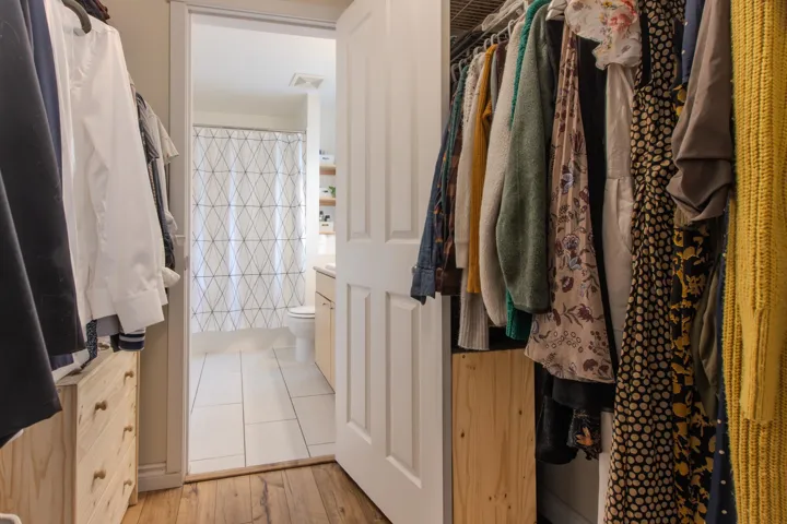 Spacious closet featuring light tile patterned floors