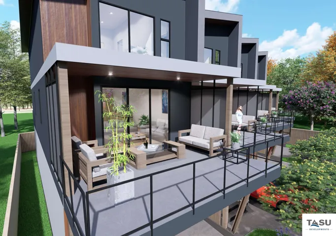 Contemporary multi-level exterior featuring dark grey siding and wood-finish accents