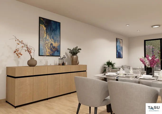 Dining area featuring light wood-finish flooring and recessed ceiling lighting