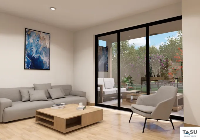 Open-concept living space featuring wood-finish flooring and recessed ceiling lighting