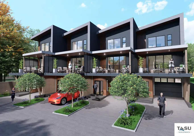 Modern townhome architecture featuring dark paneling and wood-finish accents