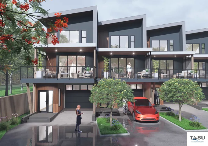 Modern residential complex featuring multiple units with a contemporary facade