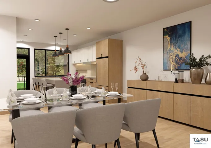 Open-concept dining area with wood-finish flooring, recessed lighting, and a prominent built-in buffet with light wood-finish cabinetry