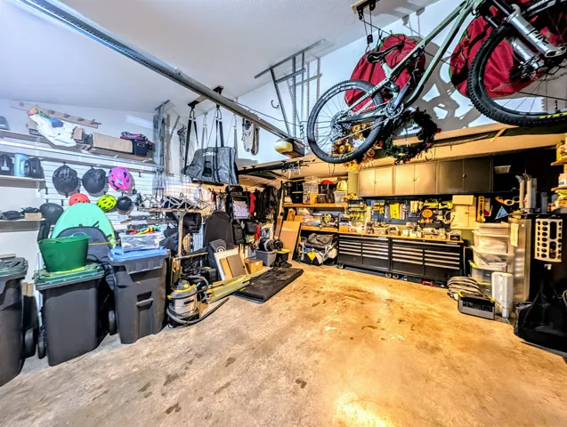 Garage featuring a workshop area