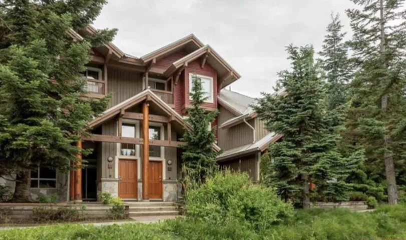 Craftsman-style house with stone siding