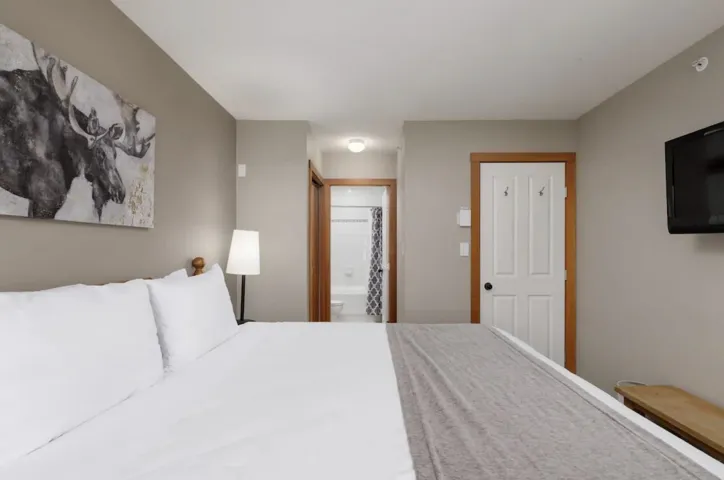 Bedroom featuring ensuite bath
