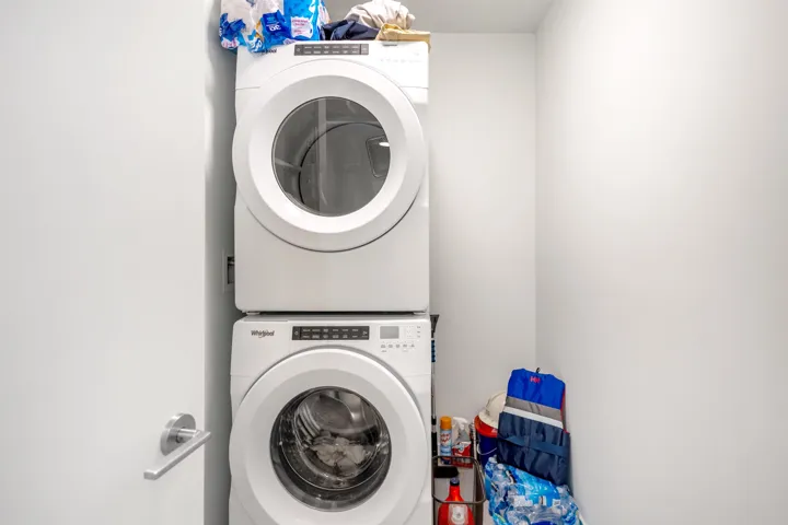 Laundry room with stacked washer / drying machine