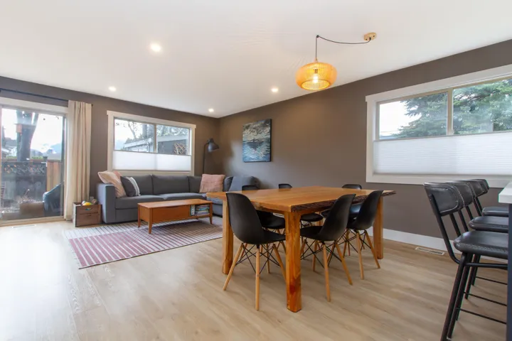 Dining area featuring baseboards, recessed lighting, visible vents, and light wood-style floors