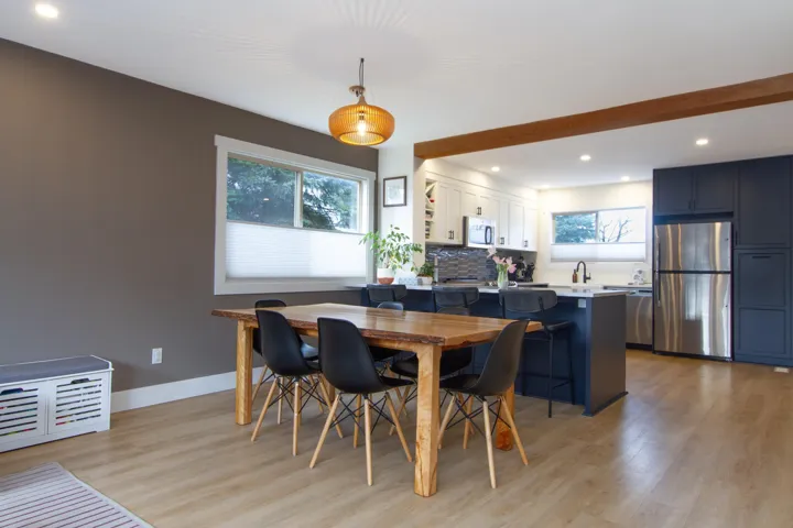 Dining space with recessed lighting, light wood-style flooring, and baseboards