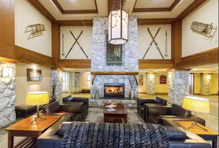Lobby with a high ceiling and crown molding