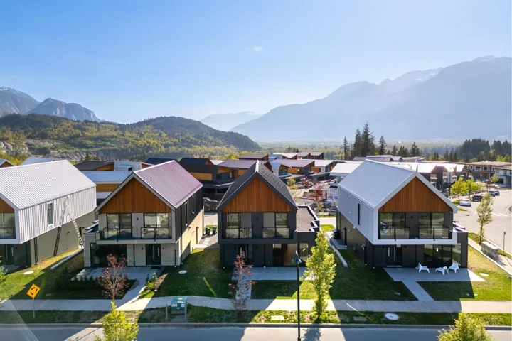Aerial view featuring a mountain view and a residential view