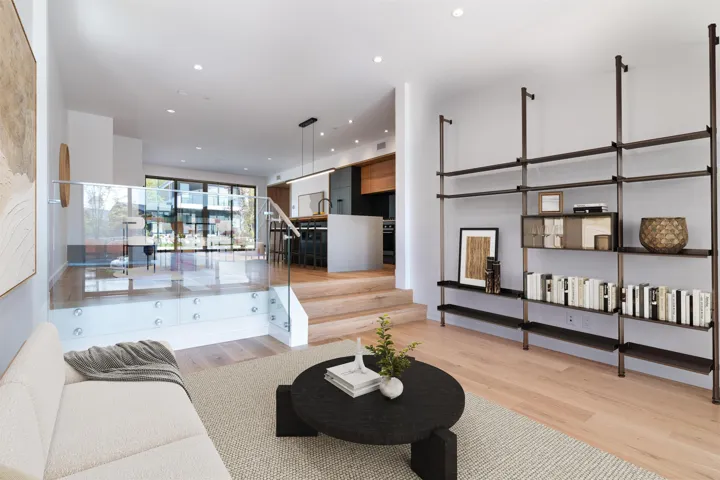 Living area featuring light wood-type flooring and recessed lighting