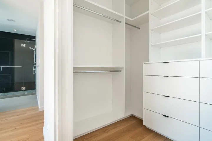 Walk in closet featuring light wood-type flooring