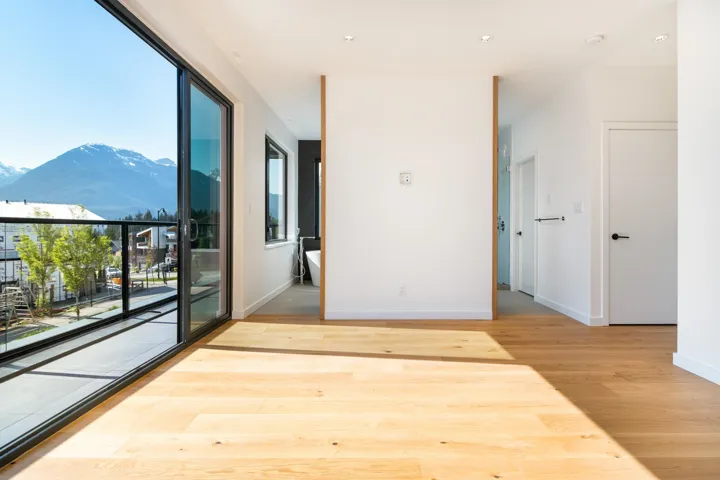 Spare room with baseboards, recessed lighting, wood finished floors, and a mountain view