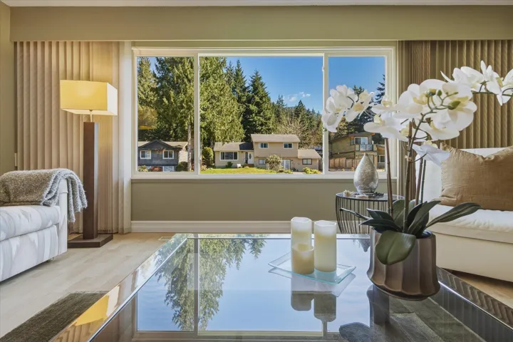 Detailed view of baseboards and wood finished floors