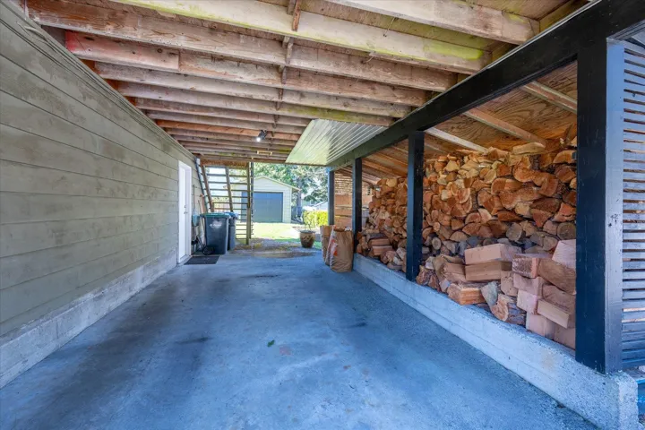 View of patio featuring an outdoor structure