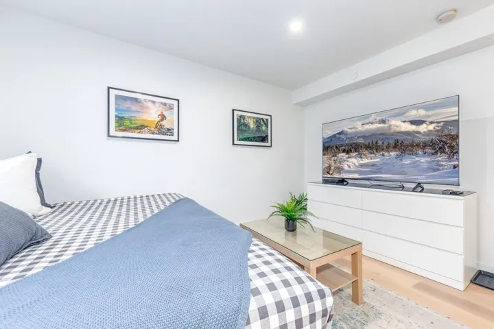 Bedroom with wood finished floors