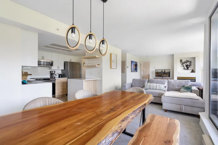 Dining space with light colored carpet
