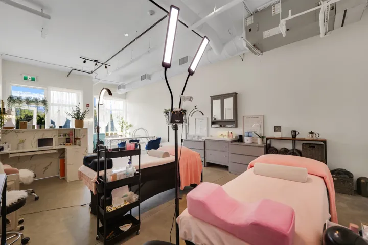 Spacious interior with high ceilings and exposed ductwork