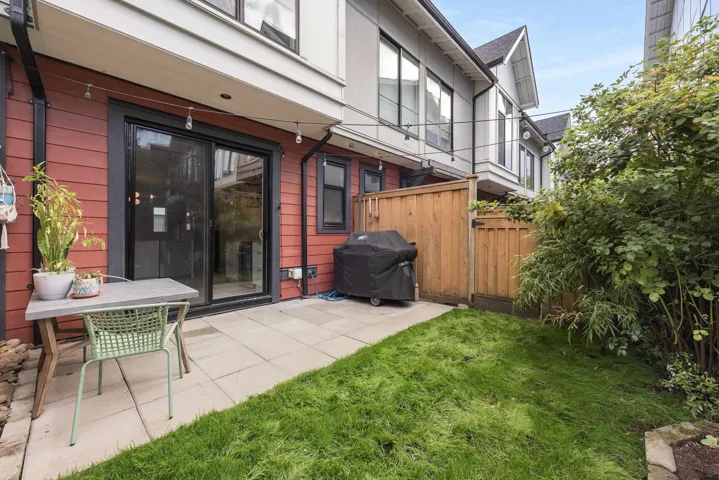 View of patio featuring a grill