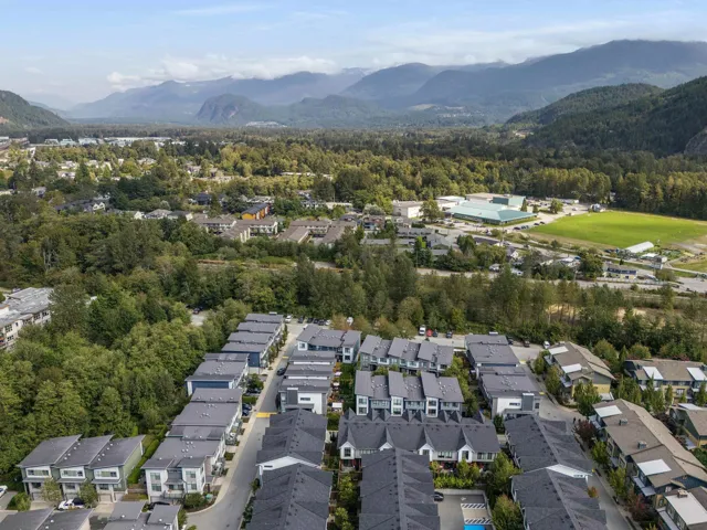 View of property location with a mountain backdrop and nearby suburban area