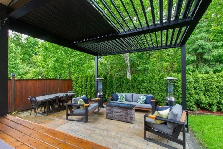 View of patio featuring outdoor dining area, fence, an outdoor living space, and a pergola