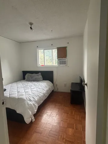 Bedroom featuring a textured ceiling