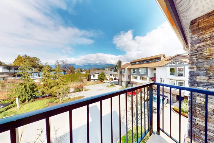 Balcony featuring a residential view