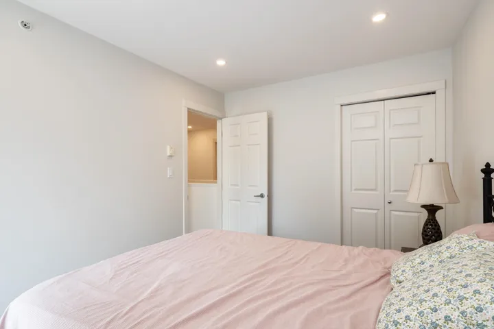 Bedroom with a closet and recessed lighting