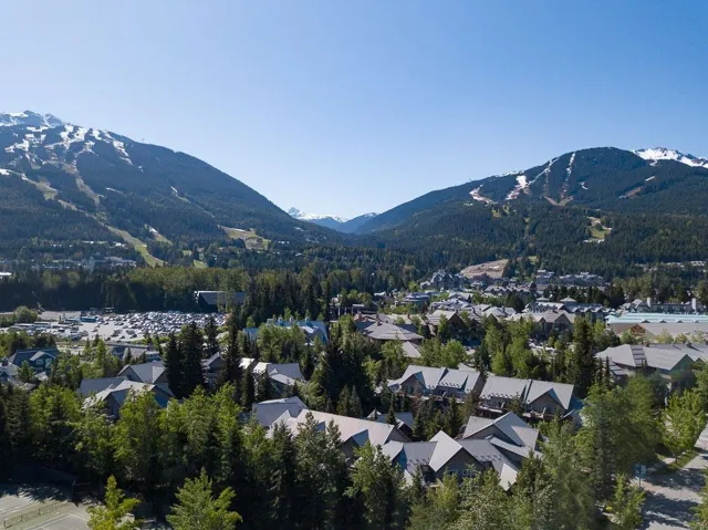 Expansive mountain scenery with snow-capped peaks