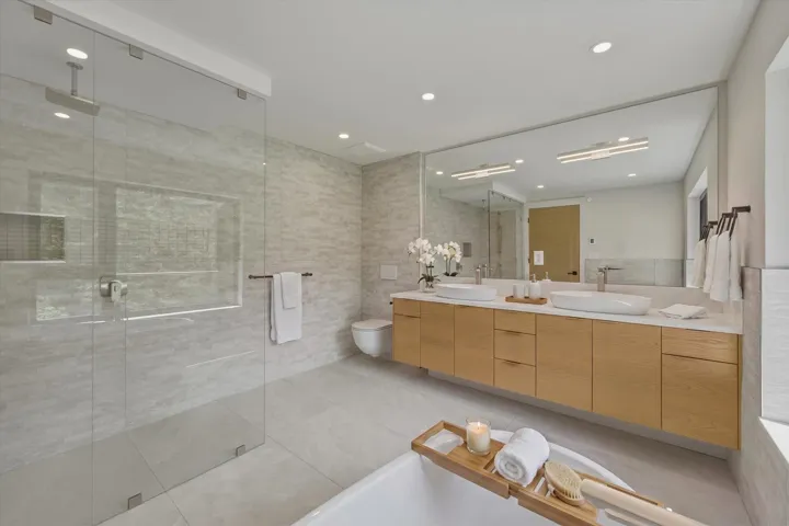 One of 3 ensuite bathrooms all similar in quality in addition to the primary ensuite bathroom
