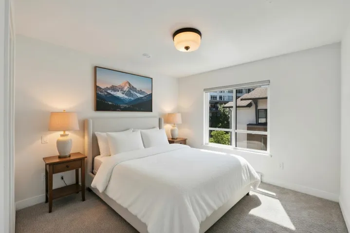 Primary bedroom with walk in closet and ensuite Bedroom has been virtually staged