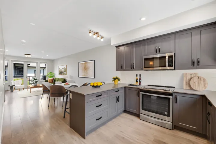 Man floor kitchen and living area vitually staged