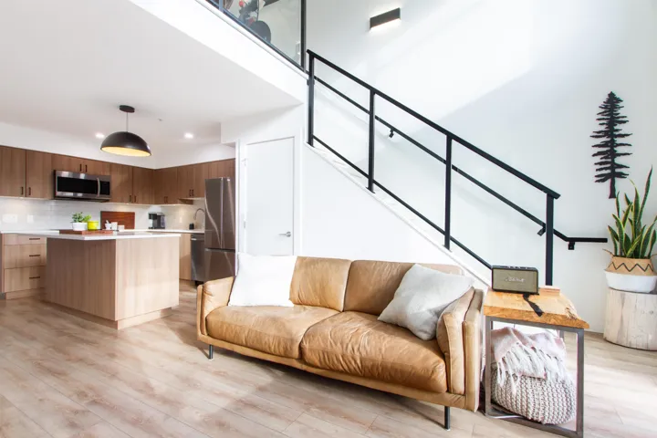 Living room featuring stairway, recessed lighting, and light wood-style floors