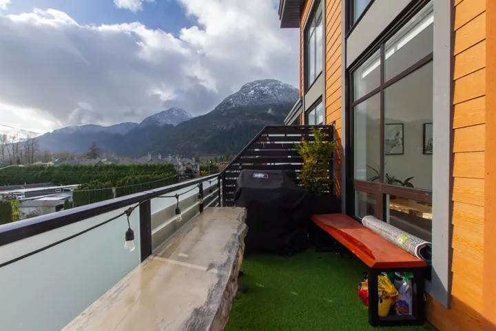 Balcony with grilling area and a mountain view