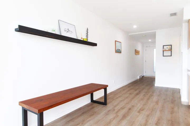 Hall featuring recessed lighting, visible vents, light wood finished floors, and baseboards