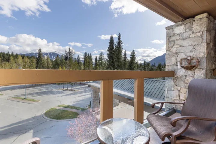 Balcony featuring a patio and a mountain view