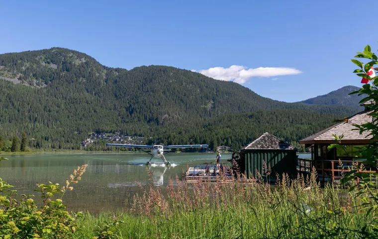 Mountain view featuring a water view and a view of trees