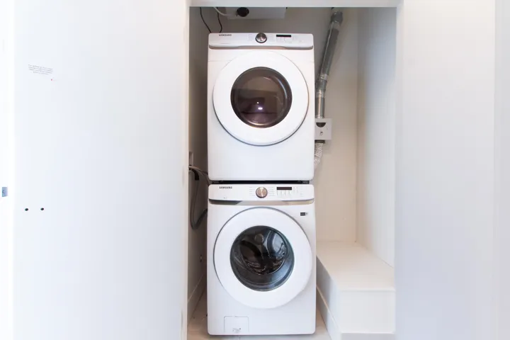 Laundry room with stacked washer / drying machine