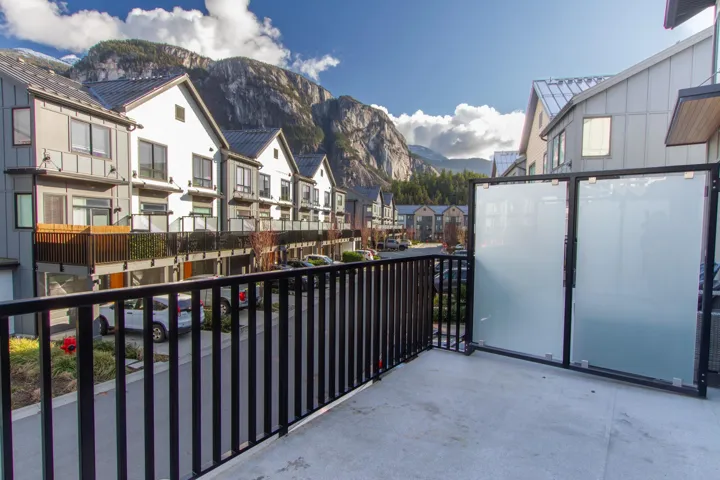Balcony featuring a mountain view and a residential view