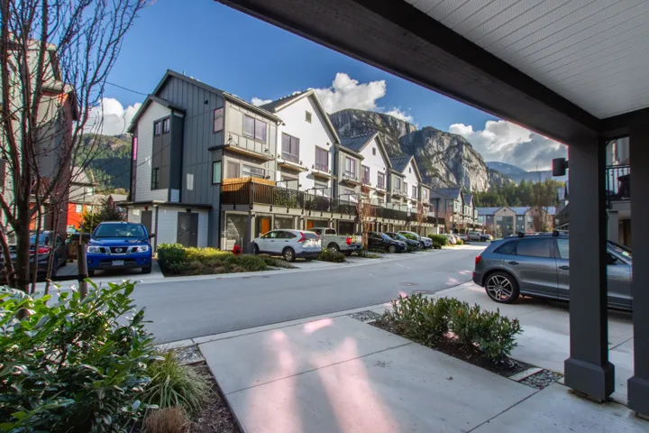 View of street with a mountain view, a residential view, and sidewalks